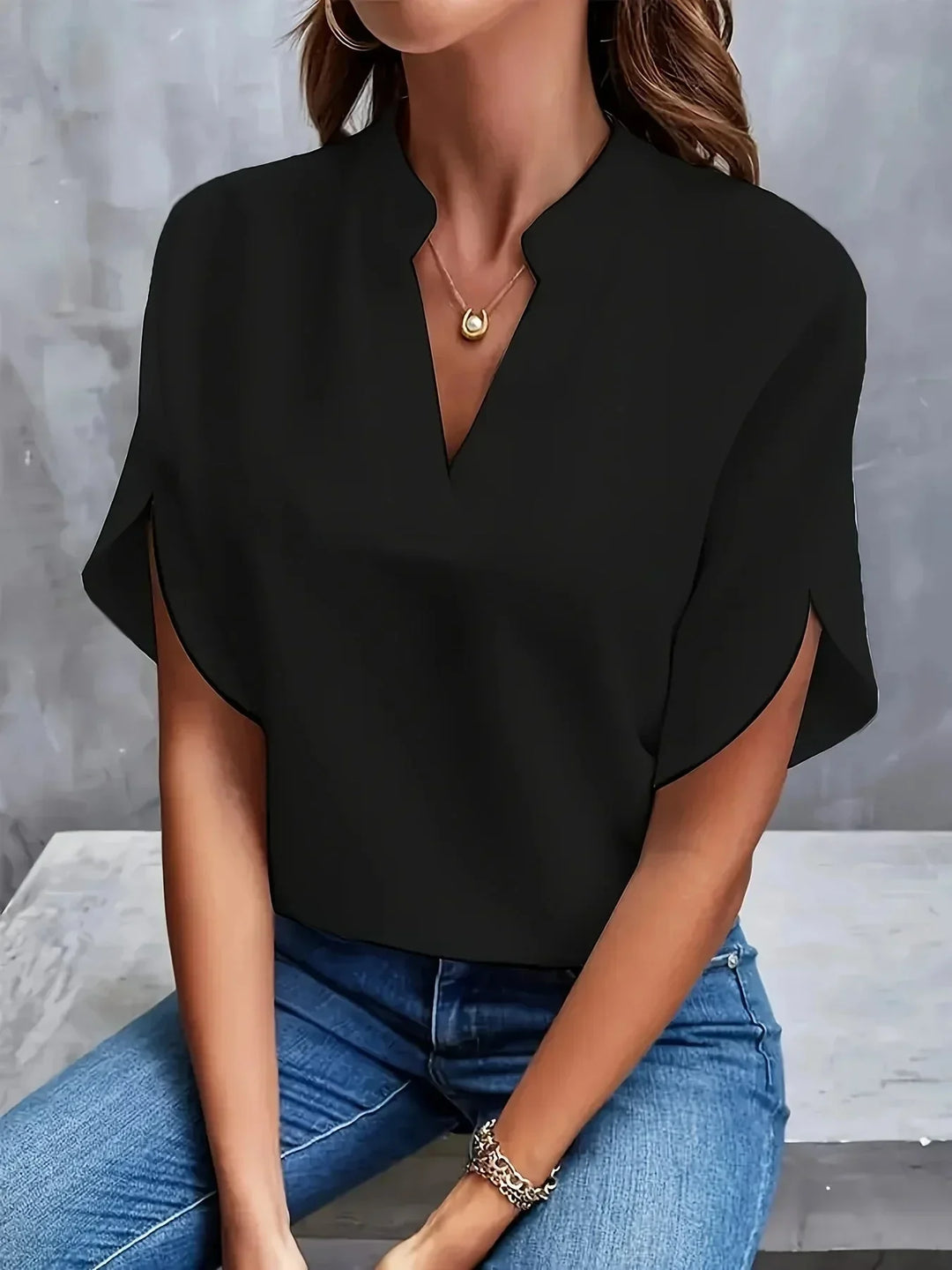 Elegant women's blouse, V-neck design, stand collar, short split sleeves. Smart casual apparel.