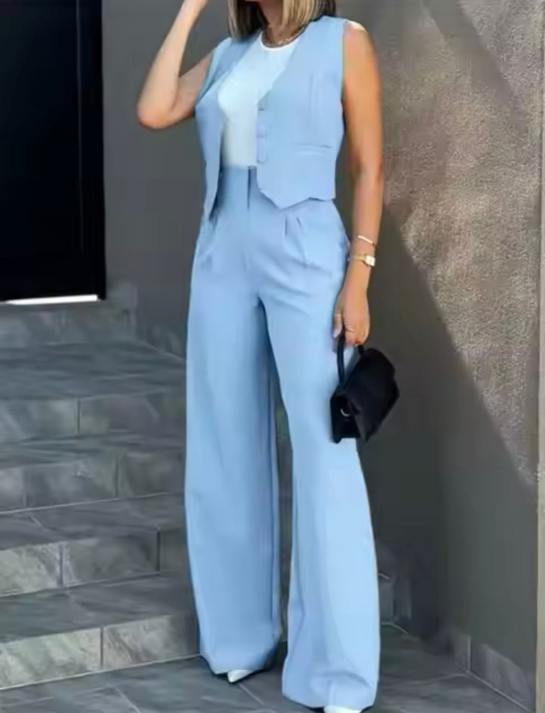 Versatile women's tailored waistcoat & wide leg trouser set. Ideal for smart casual, work, or elegant summer events.