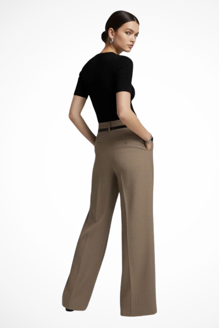 Modern women's wide leg pants with tailored fit and belt detail. Ideal for formal or casual outfits.