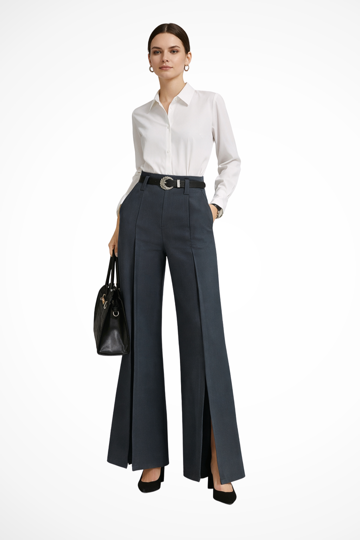 Flowing wide leg tailored trousers for women, featuring a decorative belt. Casual yet formal pants.