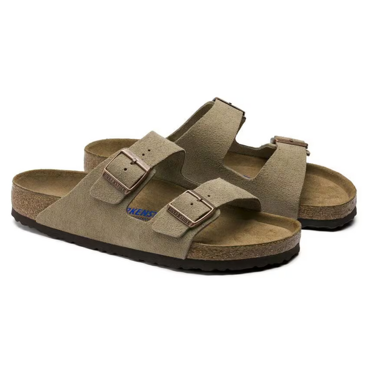 Detail of the ergonomic cushioned sole on women's taupe comfort sandals, designed for all-day summer comfort.