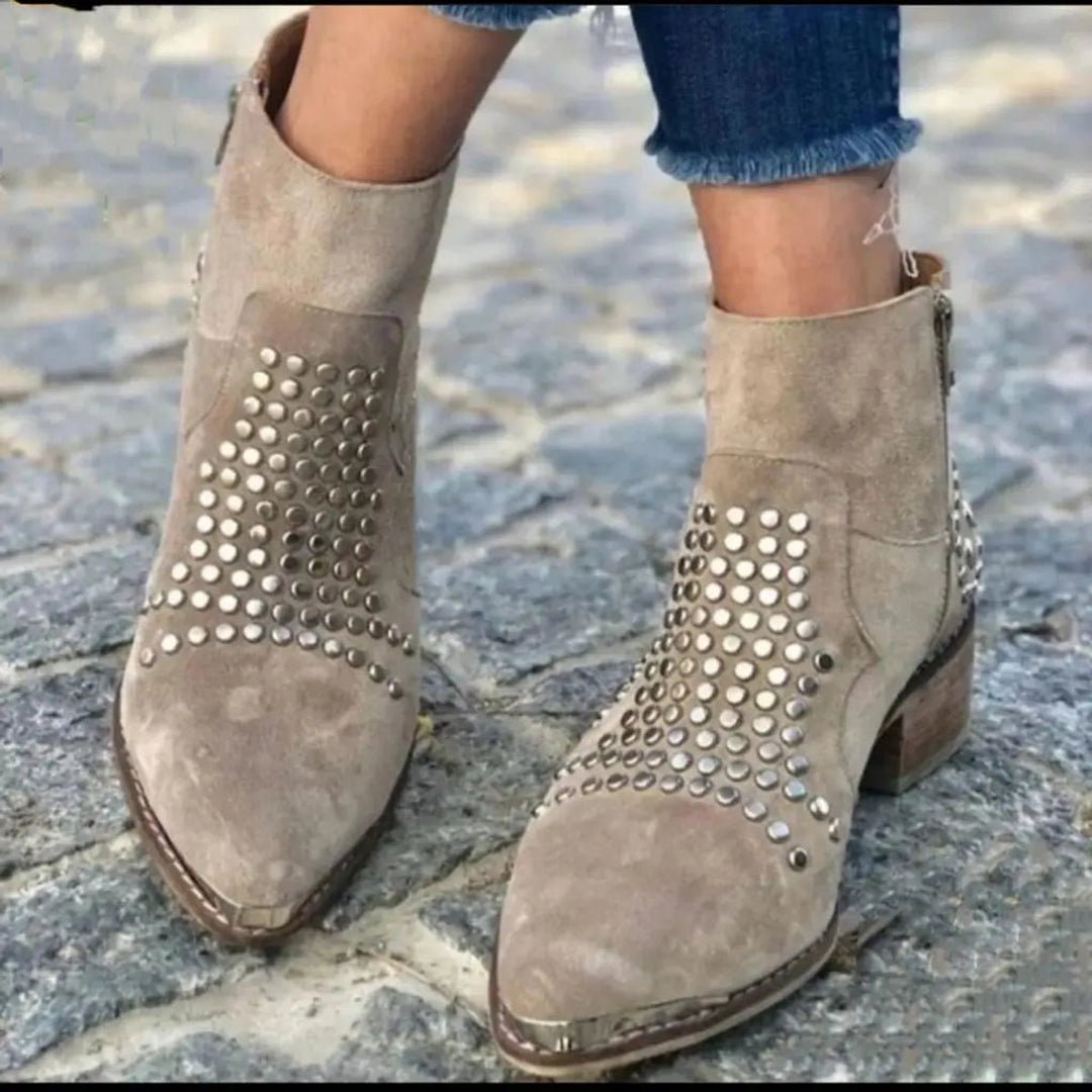 Comfortable women's studded taupe ankle boots with a pointed toe & block heel, perfect for edgy fashion.