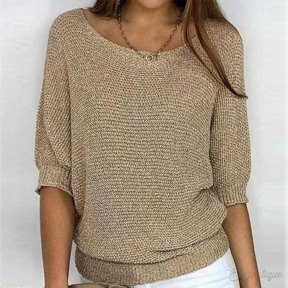 Women's textured batwing sleeve top, relaxed fit for casual wear and everyday fashion.