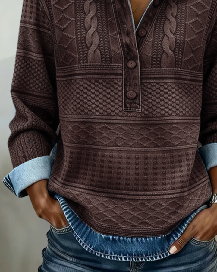 Half-zip women's textured sweatshirt with a classic collar, a comfortable long-sleeve top for cooler days.