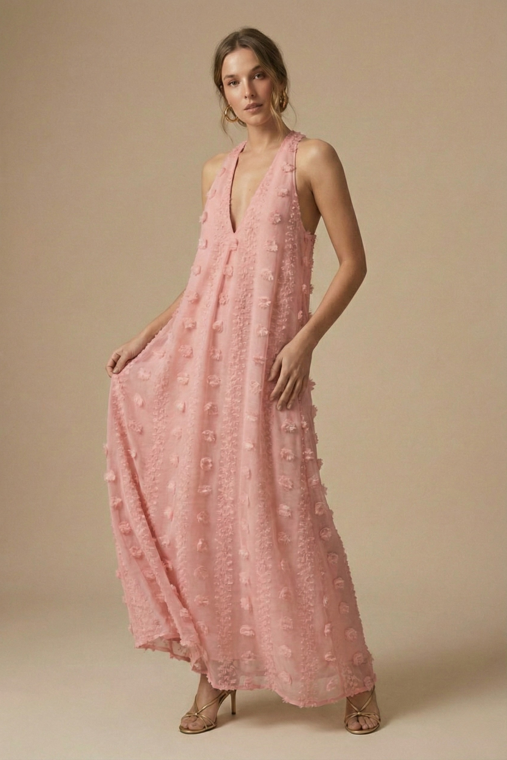 Stylish women's party maxi dress; textured fabric, halter neck, backless design & stunning 3D floral details.