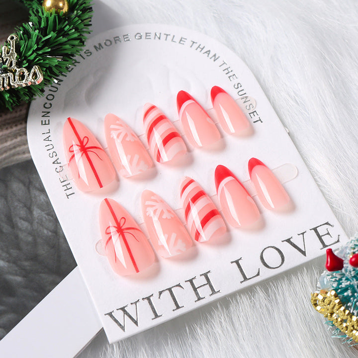 Beautiful themed press-on nails applied to fingers, showcasing an instant, salon-quality DIY manicure.