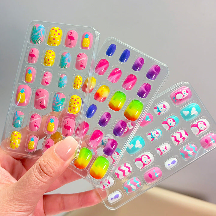 Vibrant, themed press-on nail art kit for women, offering various stylish designs & hassle-free manicure.