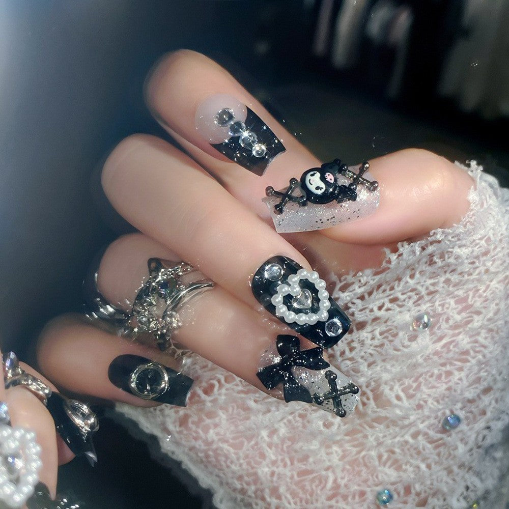 Women's themed press-on nail set, 24 pc, featuring unique designs for quick & easy nail art.