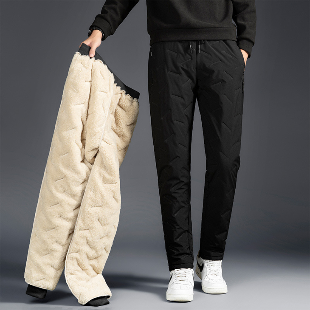 Women's thermal waterproof winter trousers, ideal for outdoor activities & snow. Insulated for cold weather.