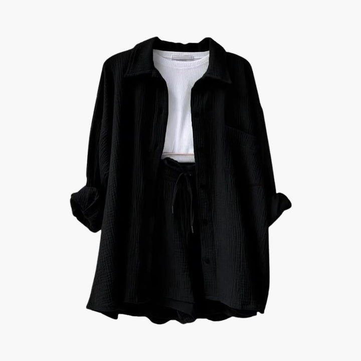 Elegant women's three-piece set, perfect for warm weather, includes shirt, crop top & high-waist shorts.