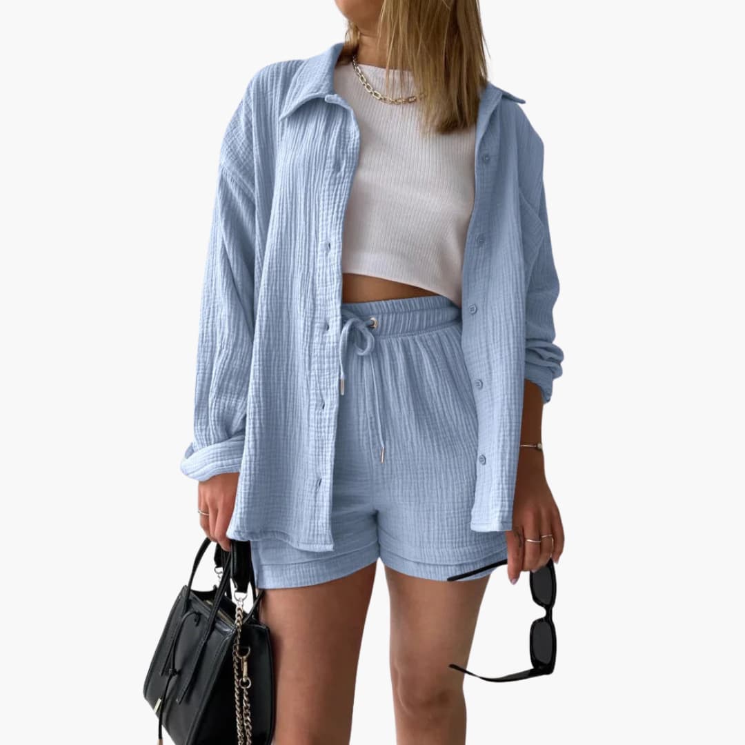 Stylish women's three-piece set with a button-down shirt, trendy crop top, and flattering high-waist shorts.