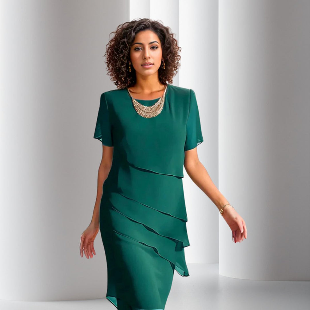 Stylish short-sleeve tiered midi dress for women, ideal as a wedding guest or evening party dress.