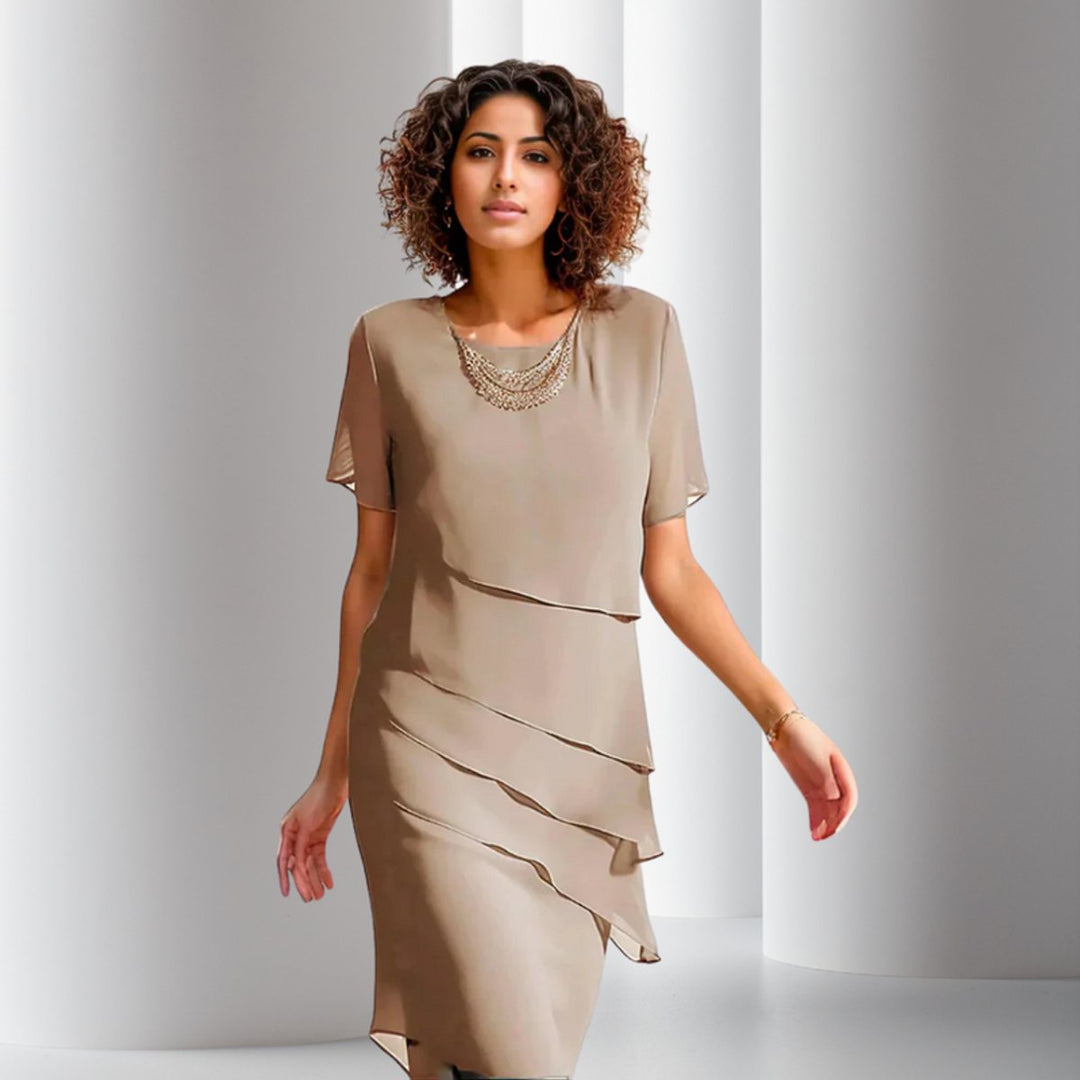 Chic women's short-sleeve midi dress featuring a tiered skirt, perfect for cocktail and formal parties.