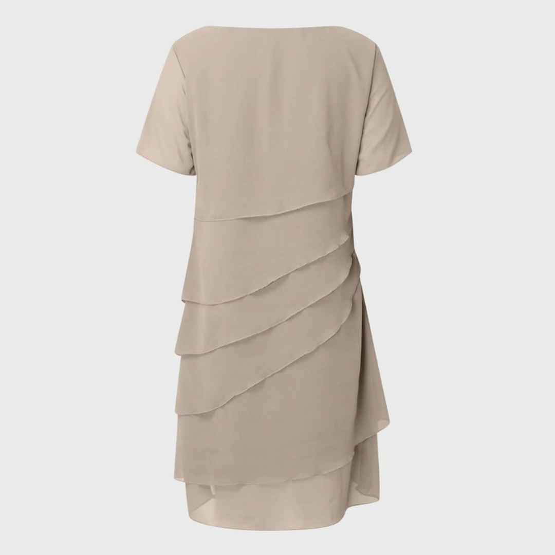 Sophisticated women's tiered midi dress with short sleeves, suitable for special occasion and evening wear.