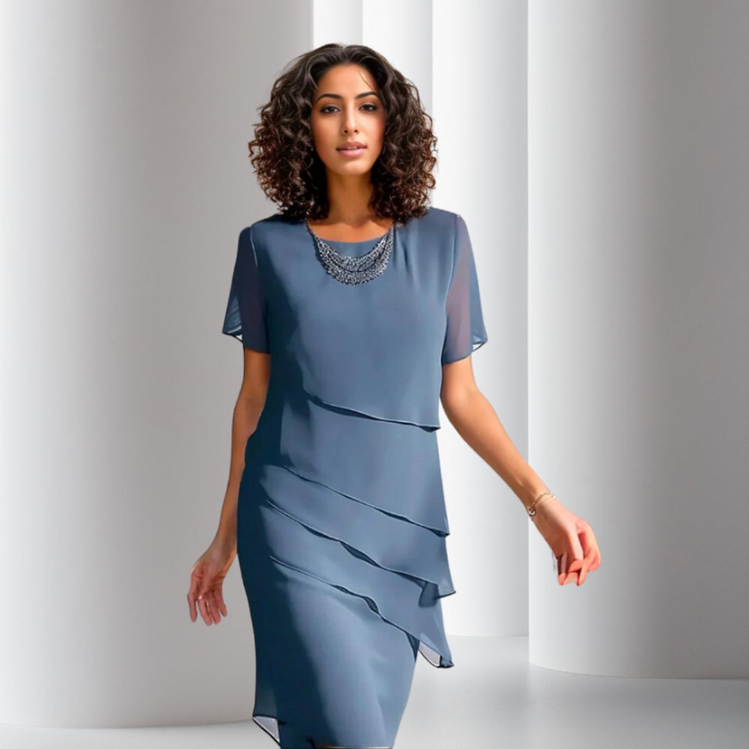Graceful women's tiered cocktail dress, short sleeve midi length, perfect for formal events & parties.