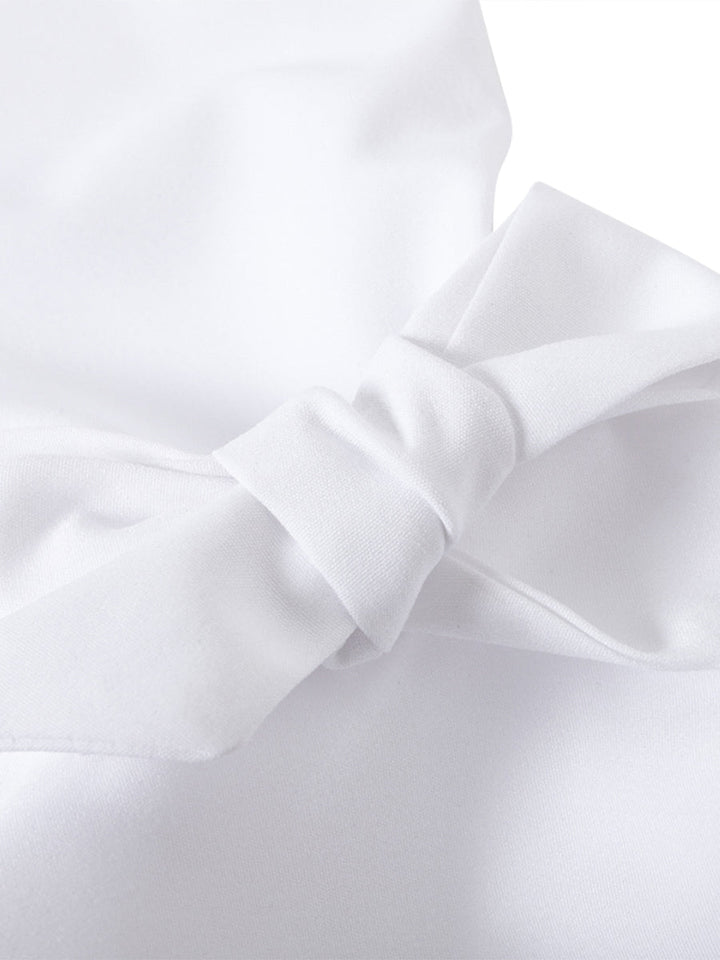 Versatile women's tiered blouse with ruffle cuffs & button up front, for work or casual.