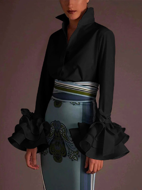 Elegant workwear women's blouse, featuring tiered ruffles and classic button up front.