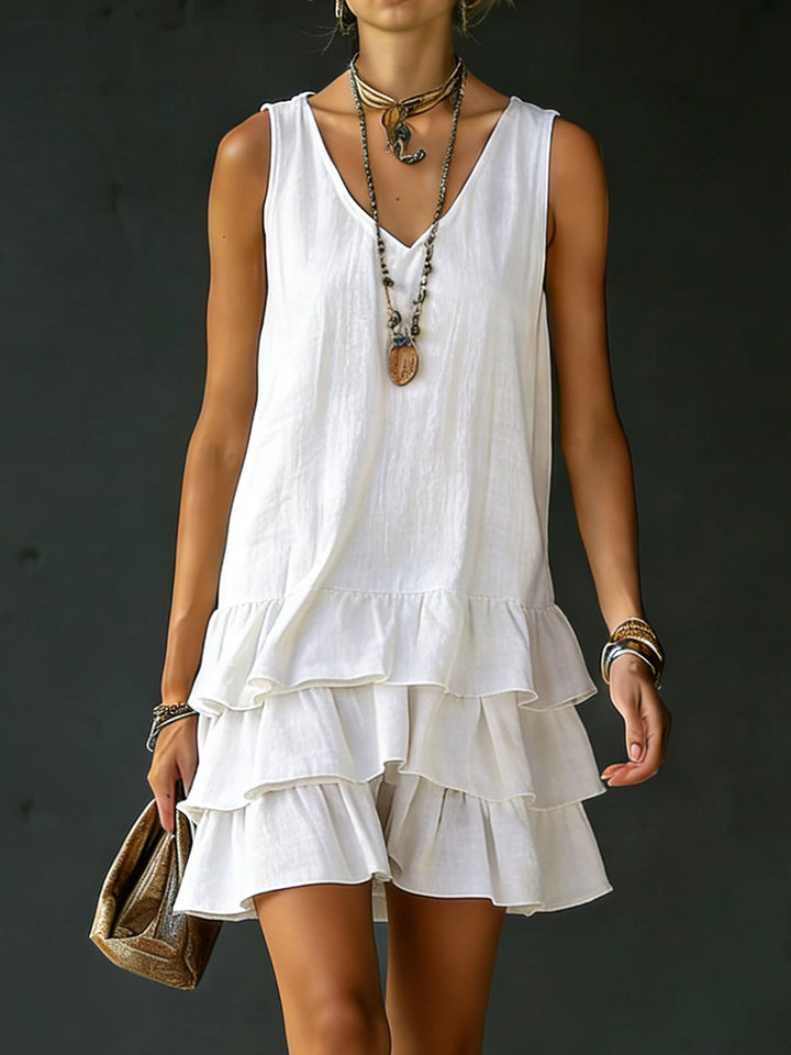 Women's tiered ruffle mini dress, V-neck, sleeveless, relaxed fit. Perfect for summer casual wear.