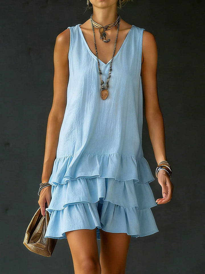Effortless style: women's tiered ruffle mini dress. Sleeveless V-neck, relaxed fit, perfect for summer fashion.