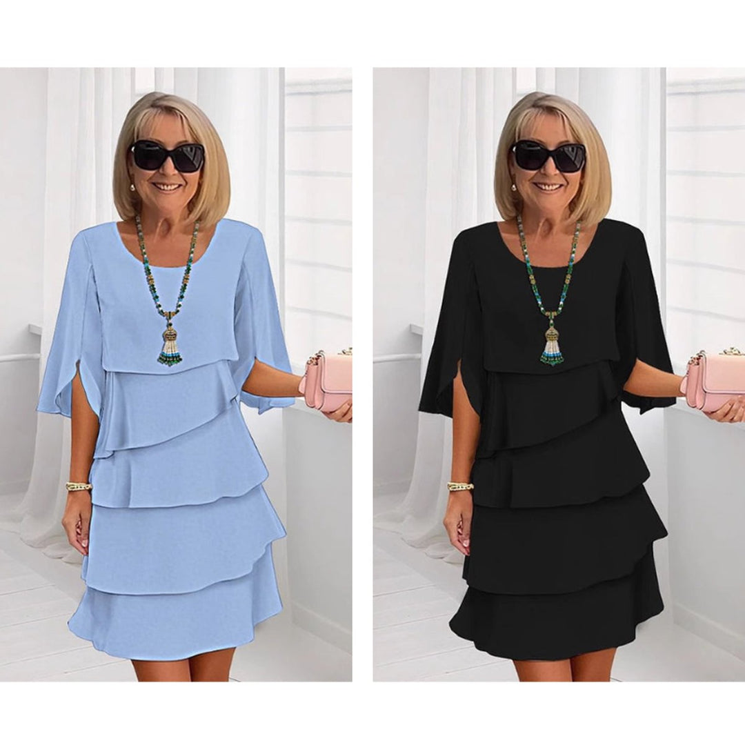 Versatile women's tiered midi dress with ruffle sleeves, great for day or evening.
