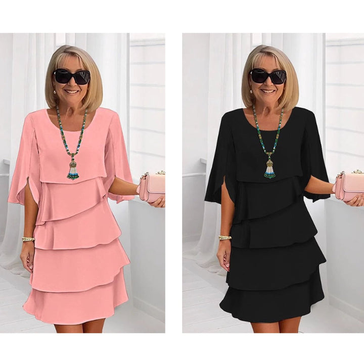 Achieve an elegant look with this women's tiered midi dress, featuring subtle ruffle sleeves.