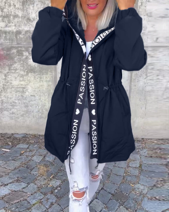 Women's classic hooded trench coat, a versatile longline jacket. Essential spring & autumn outerwear for fashion.