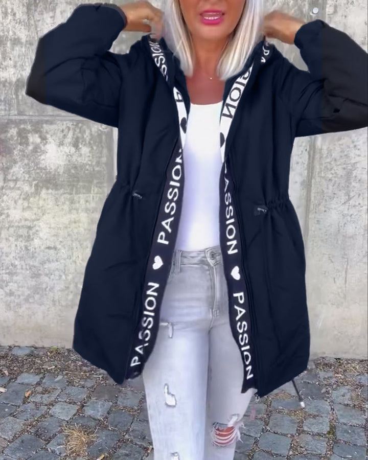 Lightweight women's hooded trench coat, a comfortable, longline outerwear piece. Modern everyday fashion style.