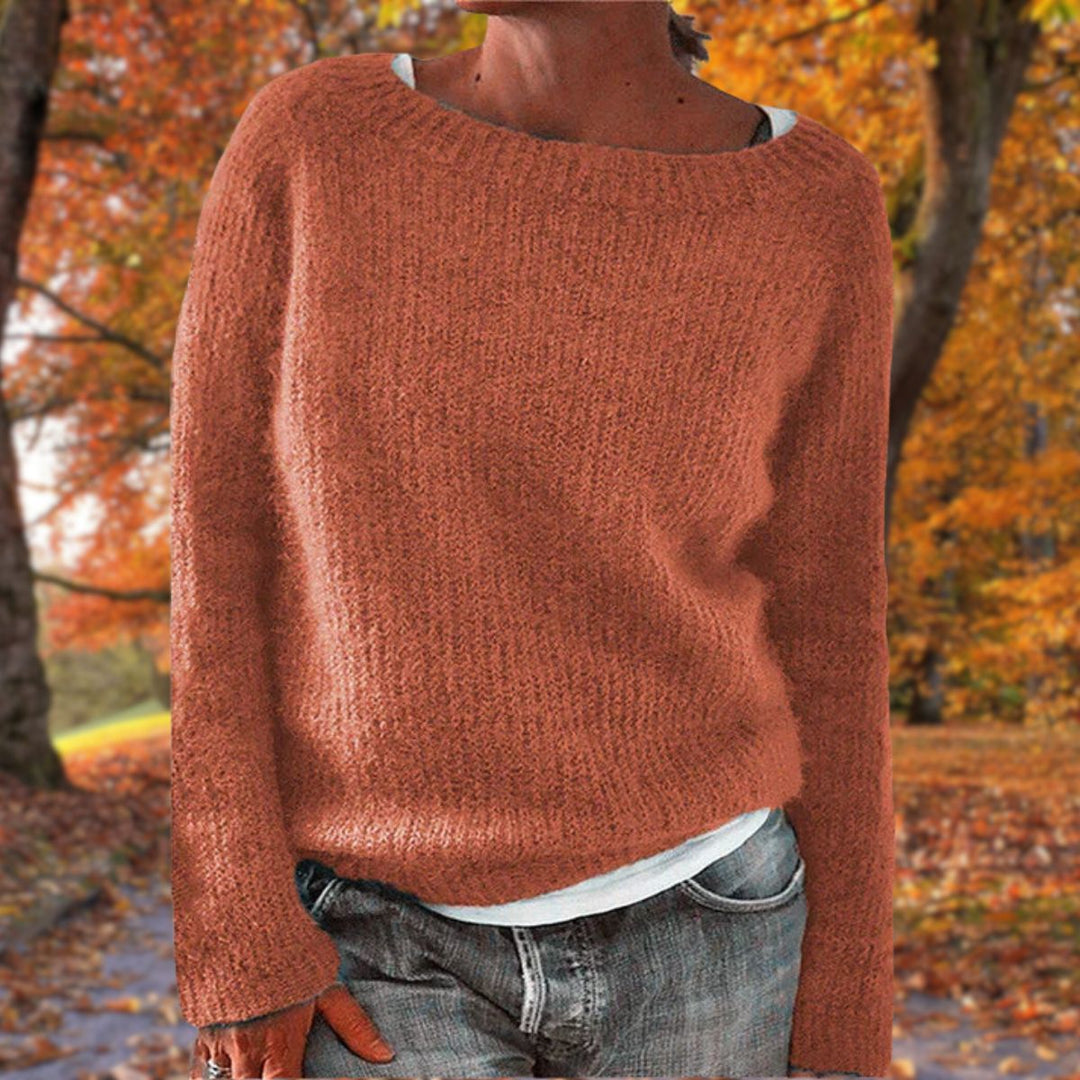 Classic women's relaxed fit pullover sweater. Elegant and comfortable, a timeless piece for any fall or winter outfit.