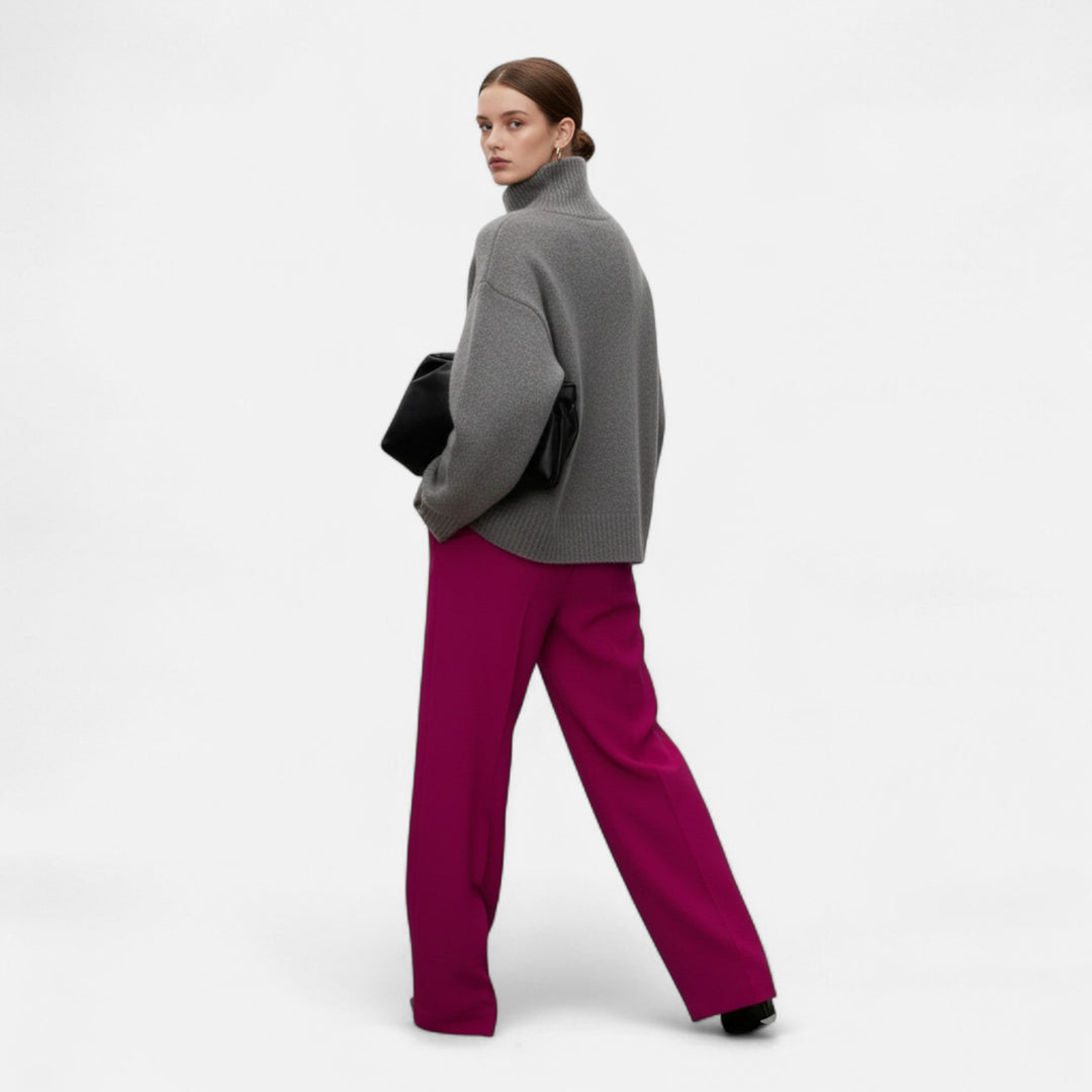 Elegant women's turtleneck sweater. Cozy, sophisticated long-sleeve top, ideal for stylish cold weather wear.