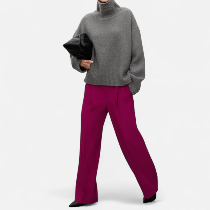 Women's long-sleeve turtleneck sweater, a cozy & elegant winter wardrobe essential for sophisticated layering.