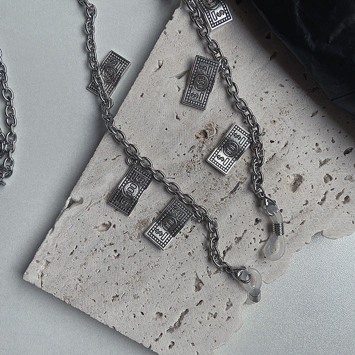 Detailed banknote pendant necklace for women. Trendy, unique fashion jewelry for a stylish, eye-catching look.