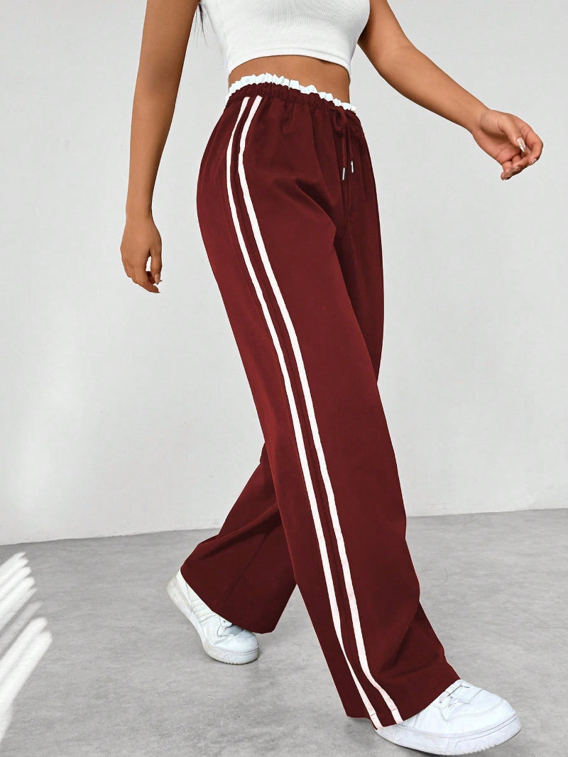 Fashionable women's wide-leg high-waist pants. Sporty pull-on design offers comfort & a trendy casual style.
