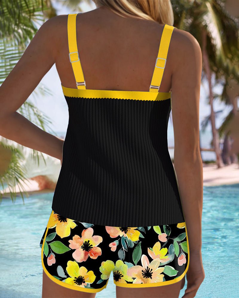Woman enjoying holiday swim in a comfortable floral tummy control tankini, two-piece beachwear.
