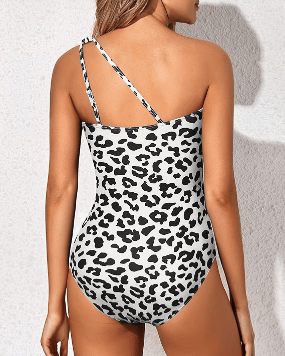 Comfortable women's one-shoulder tummy control swimsuit, perfect for a flattering beach look.