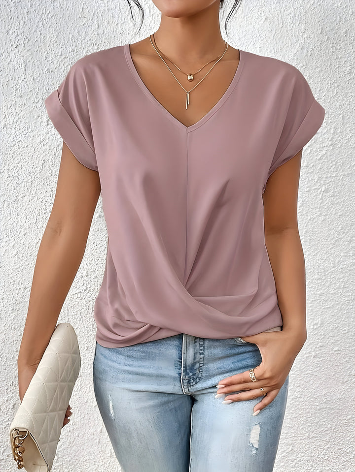 Women's twist front V-neck blouse with short sleeves, a stylish and effortless casual top for everyday wear.