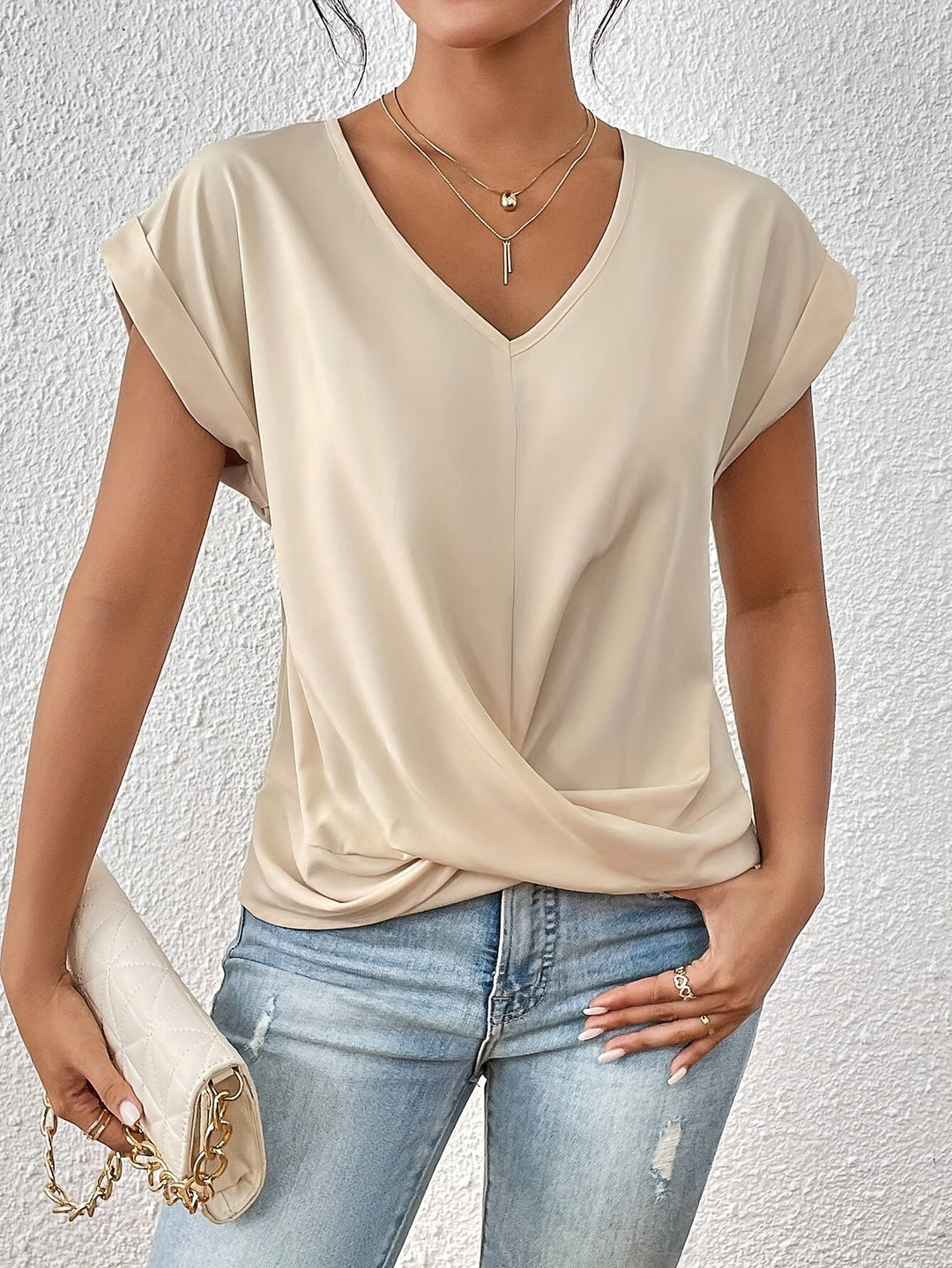 Lightweight women's short sleeve V-neck blouse with a flattering twist front, the perfect summer shirt for any occasion.