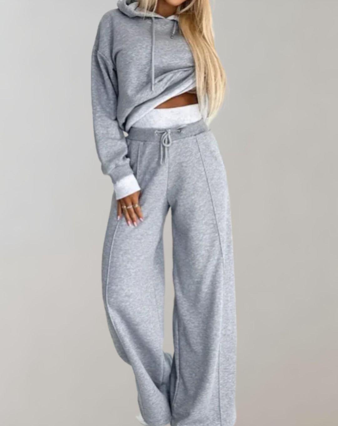 Stylish women's wide-leg trousers, part of a matching two-piece set, offering comfort for loungewear or casual outings.