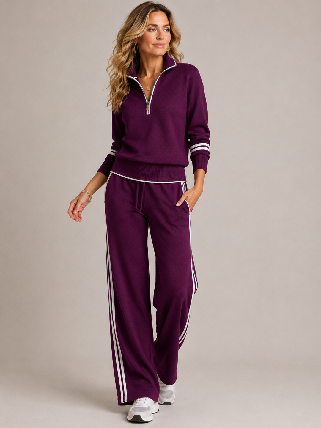Cozy women's matching knit set featuring quarter zip top & wide leg pants. Perfect for casual wear & lounging.