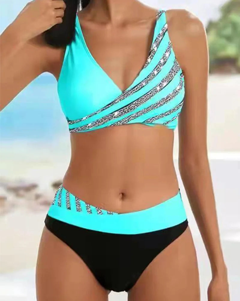 Stylish women's two-tone striped V-neck bikini set. High-waisted bottom, modern swimwear for summer fashion.