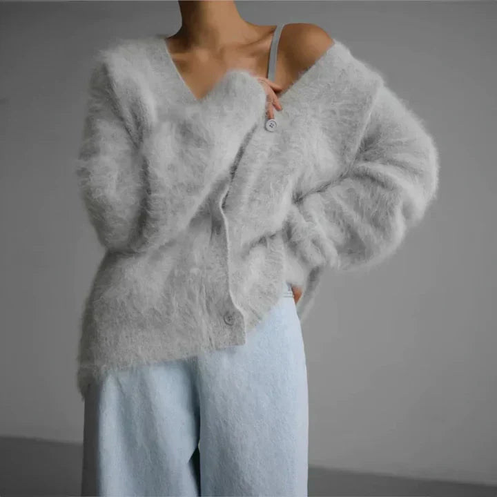 Wrap yourself in this ultimate soft women's cardigan. Comfortable long sleeve, open front for cozy style.