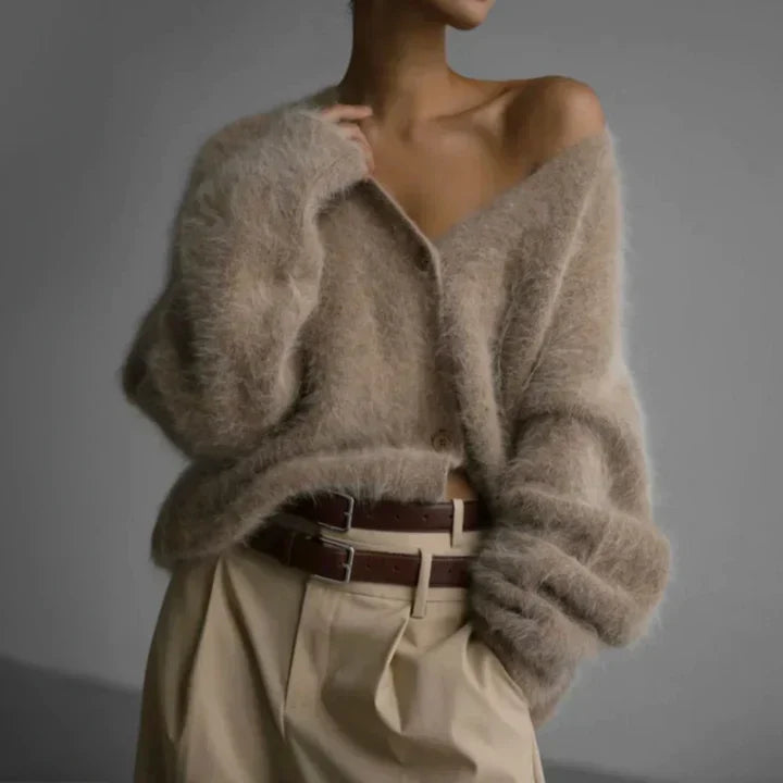 Comfortable women's open front cardigan. Soft knit sweater, long sleeve, perfect for cozy and elegant style.