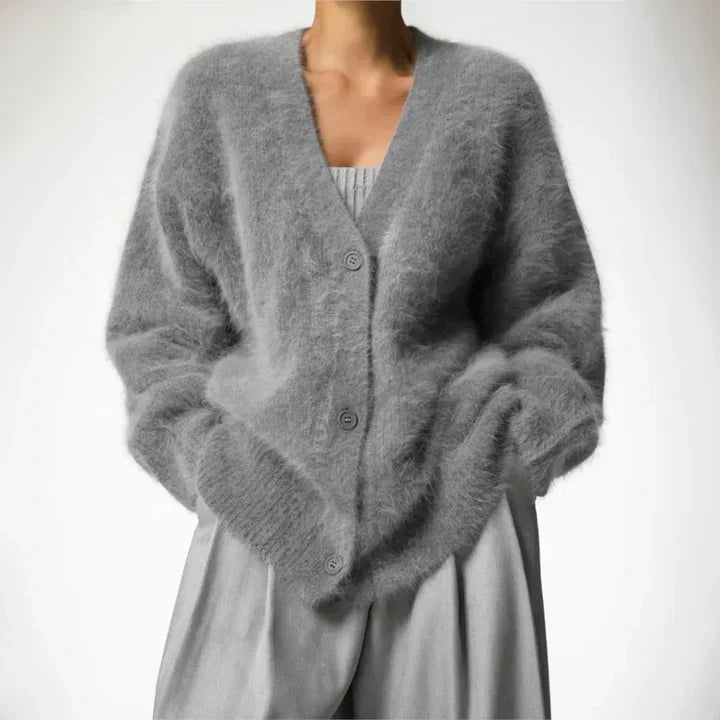 Chic women's long sleeve cardigan. Soft, comfortable, and versatile for everyday elegant layering.