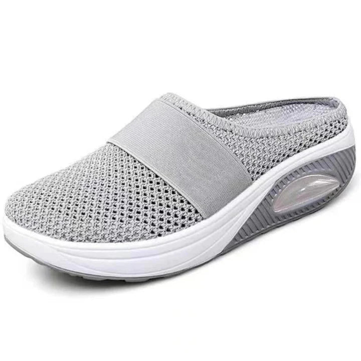 Top-down view of breathable mesh slip-on walking shoes for women, offering easy comfort and a snug fit.