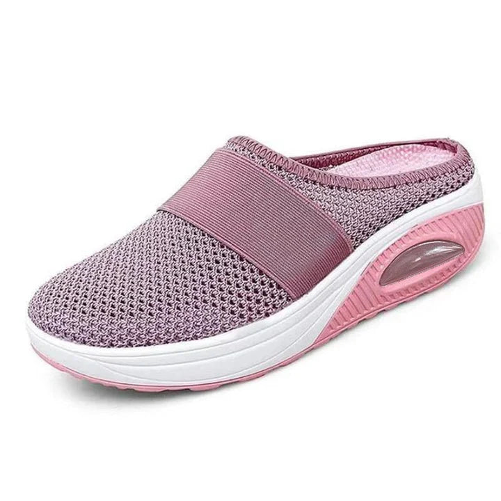 Front view of women's Ultra Comfort walking shoes, showing the roomy toe box and flexible slip-on design.