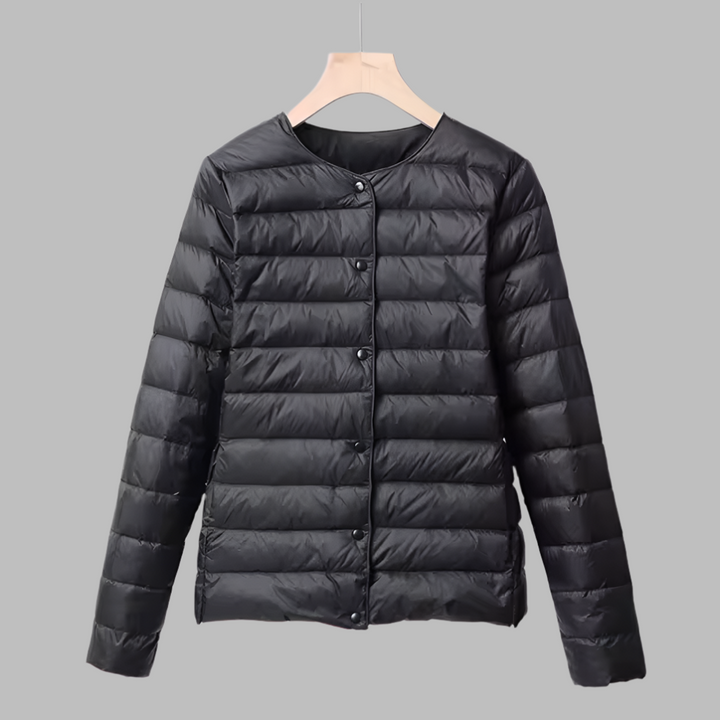 Packable women's down jacket, ultralight & collarless for easy layering. Ideal casual spring outerwear.