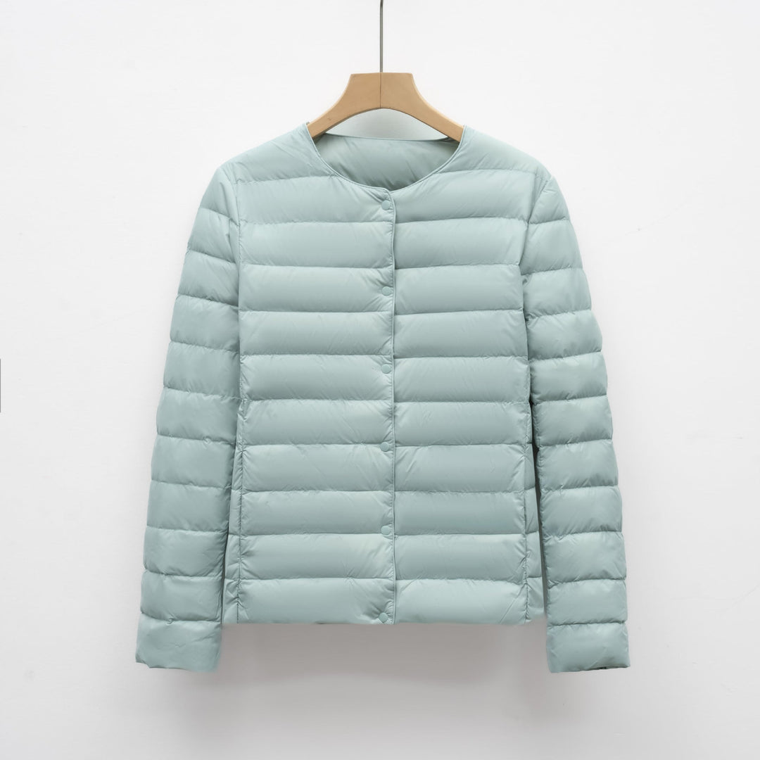 Stylish women's ultralight collarless puffer jacket for spring & mild winter. Great for layering & travel.