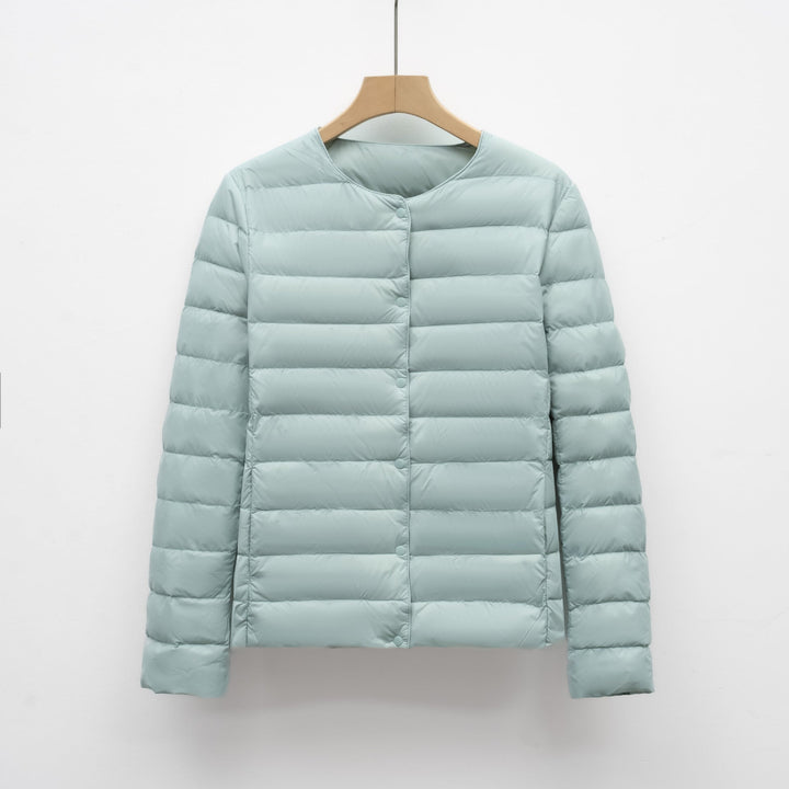 Stylish women's ultralight collarless puffer jacket for spring & mild winter. Great for layering & travel.