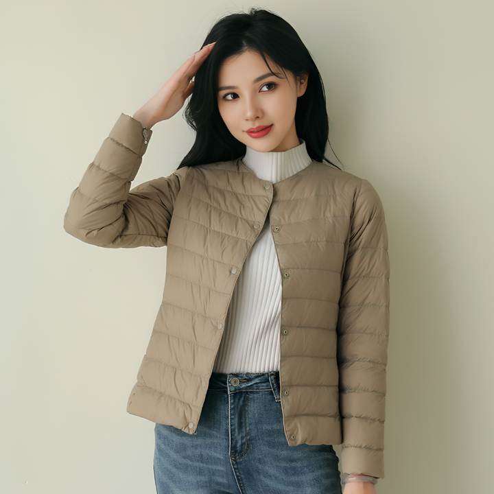 Plus size women's ultralight collarless puffer jacket. Comfortable lightweight outerwear for spring & travel.
