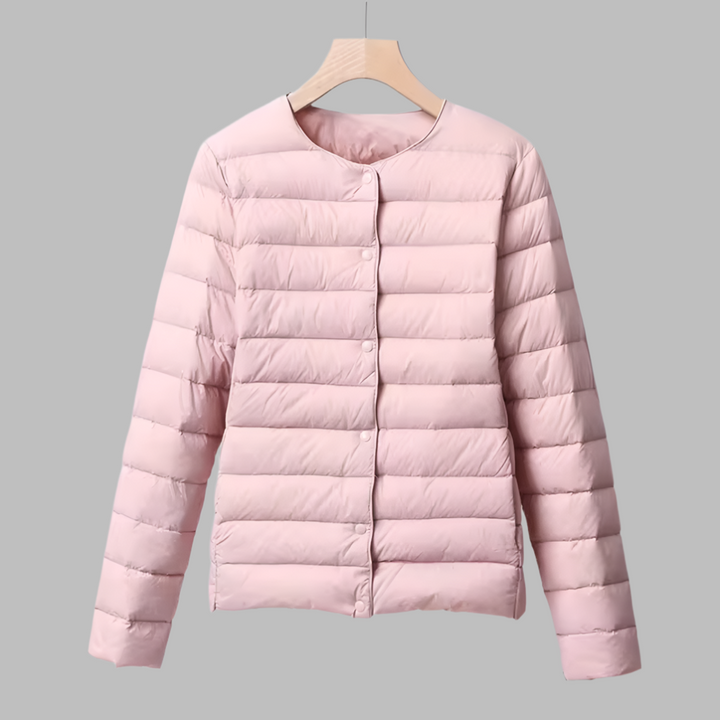 Versatile women's collarless down jacket. Ultralight & packable for casual style, layering, & travel fashion.