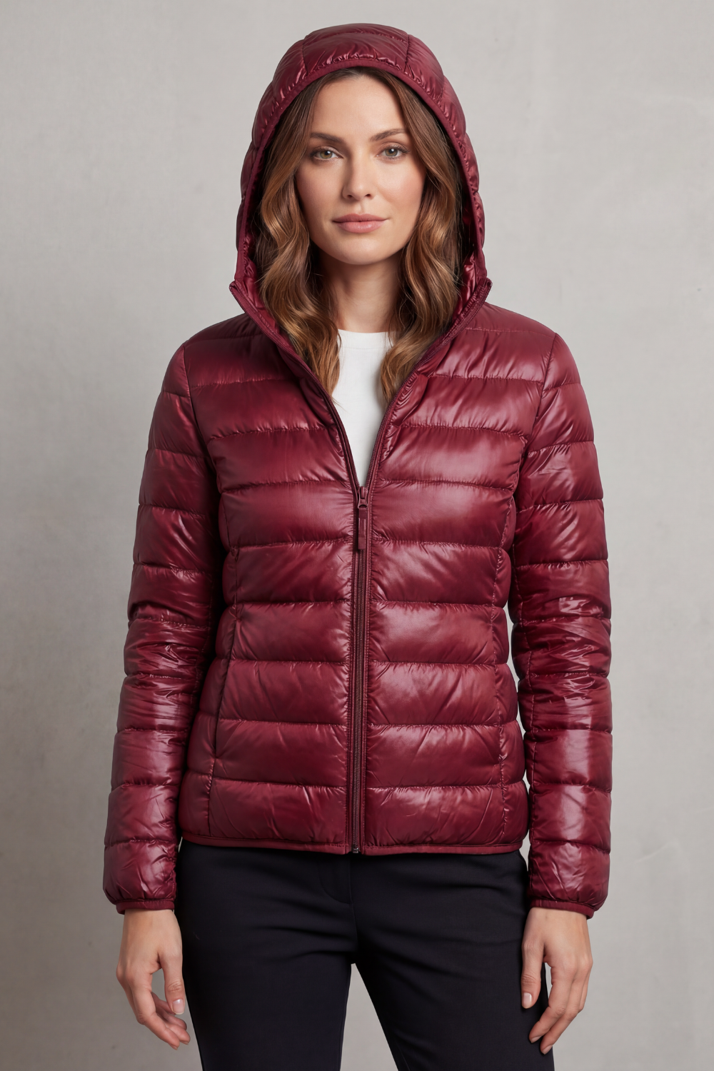 Women's ultralight puffer coat, hooded & compact for travel and cold weather.